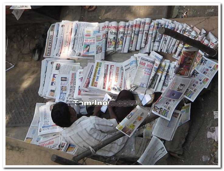 Newspaper vendor near zion koliwada