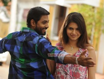Tamil Movie Maalai Pozhudhin Mayakathilaey Review and Stills