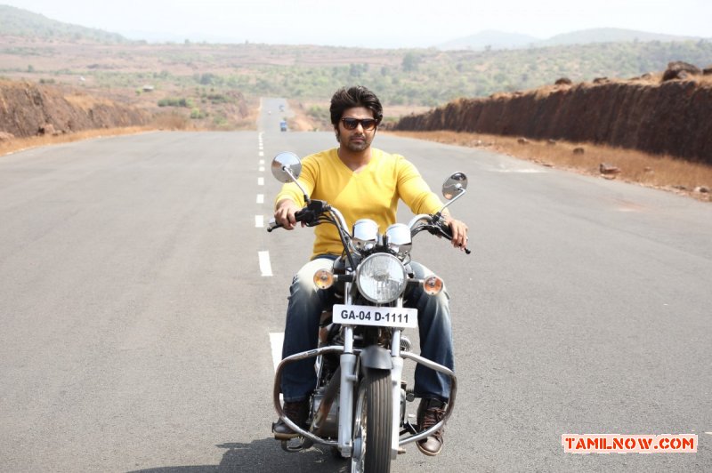 Arya On Bike In Meagaamann Tamil Movie 91