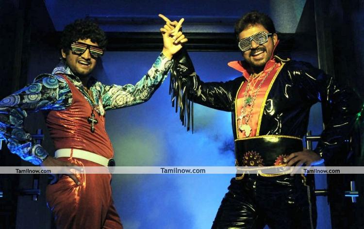 Karthi And Santhanam In Siruthai 9