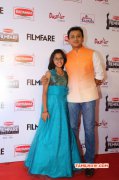 Uthra And Unnikrishnan At 62 Filmfare Awards 48