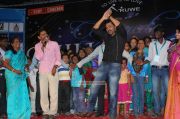 Karthi Dancing With Aruwe Homeless Children Stills 2633